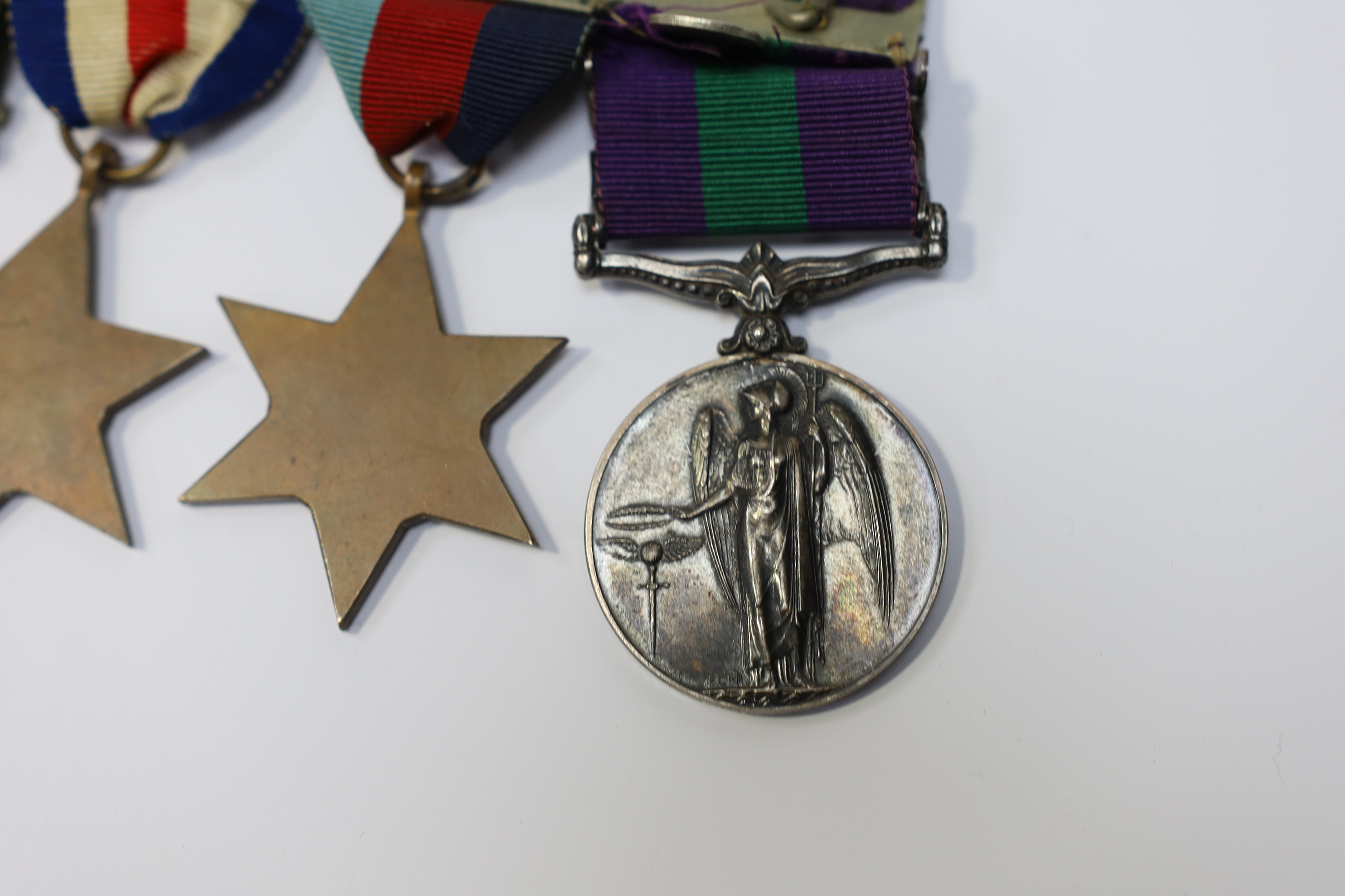 A WWII medal group awarded to Pte. J. Langridge S. Staff, comprising; a General Service Medal with two bars for Palestine and Palestine 1945-48, stamped to the edge with the recipient’s details, together with a 1939-45 S